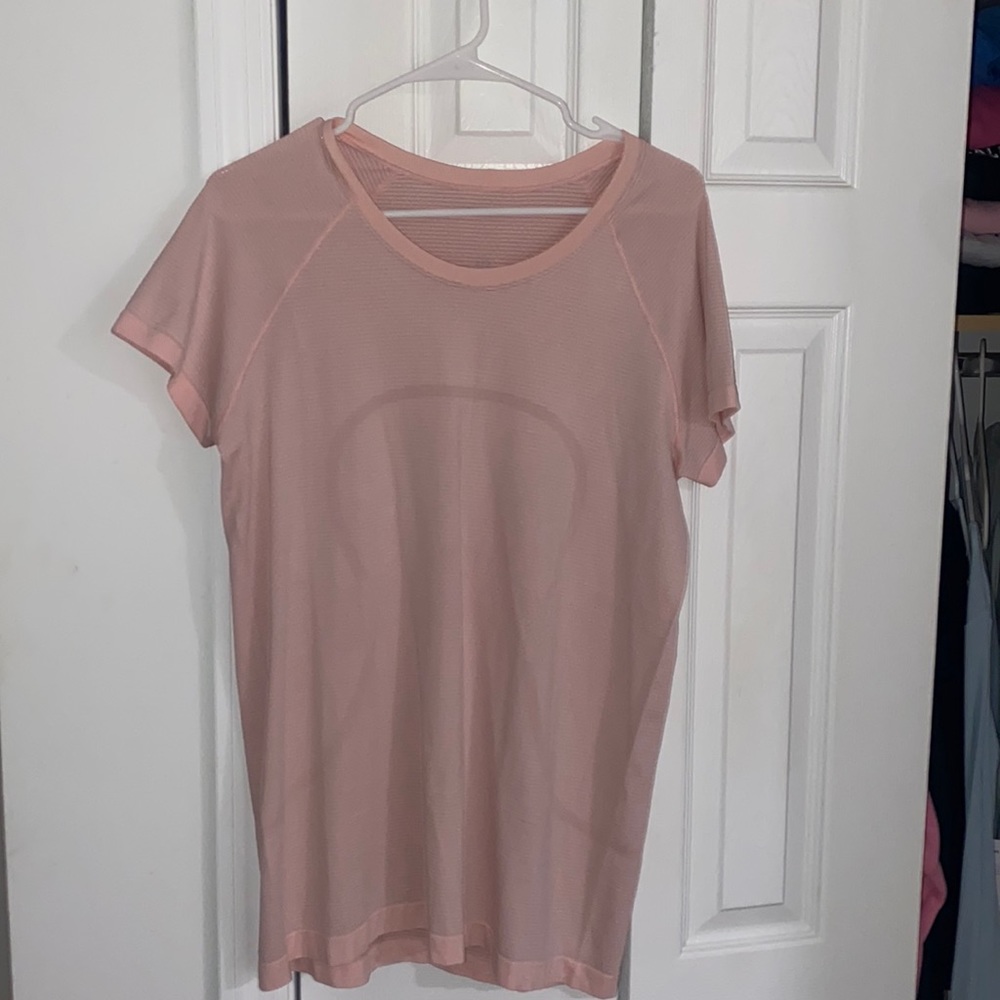 Size 12 lululemon swiftly tech 2.0 -  never worn. Tags are off can’t return
